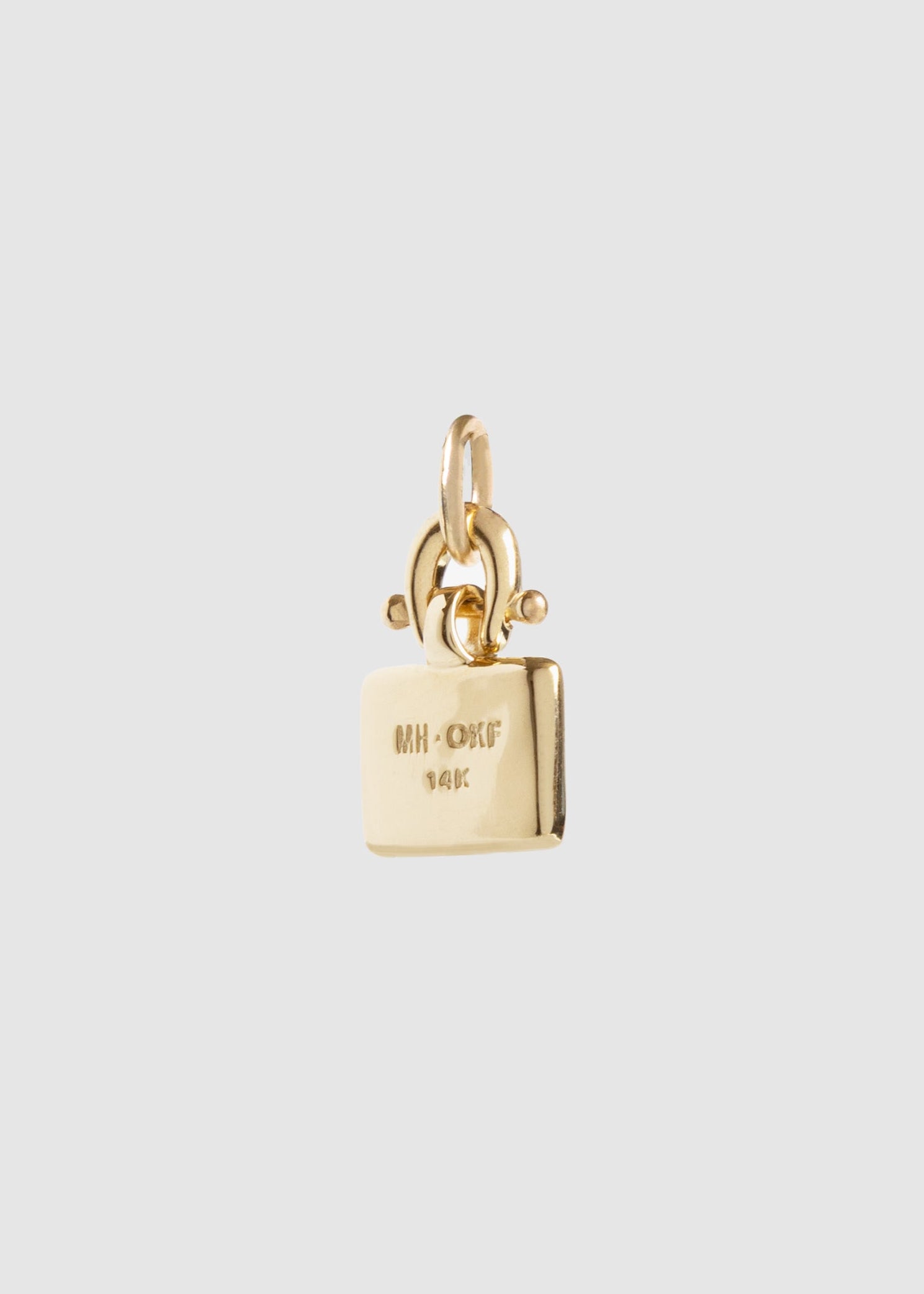 M. HISAE x OKAY FINE — Garnet Pear Tablet Charm