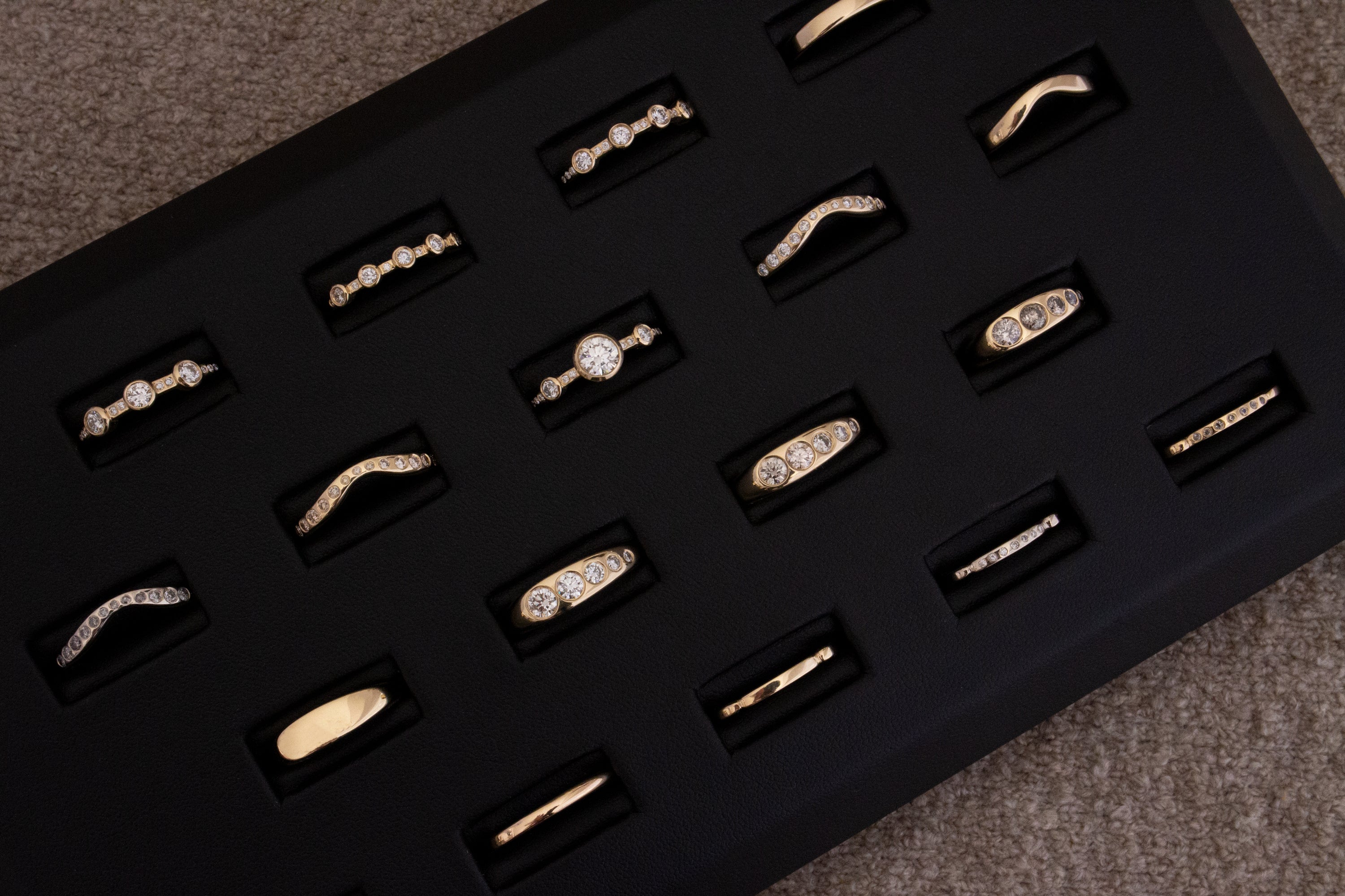 M. Hisae Commitment Collection in a black ring display.